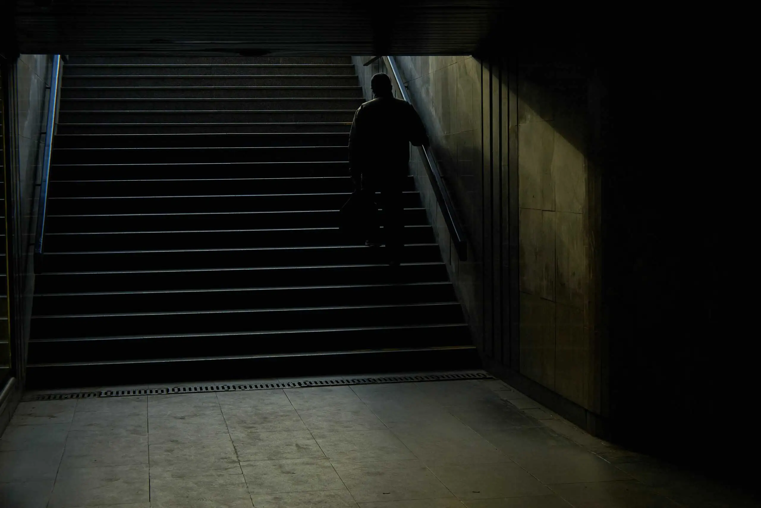 A man standing in a corner