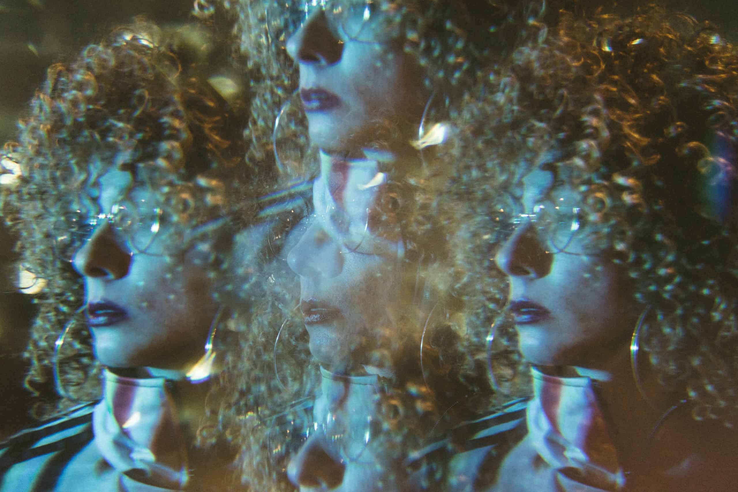 Portrait of a woman superimposed on itself multiple times